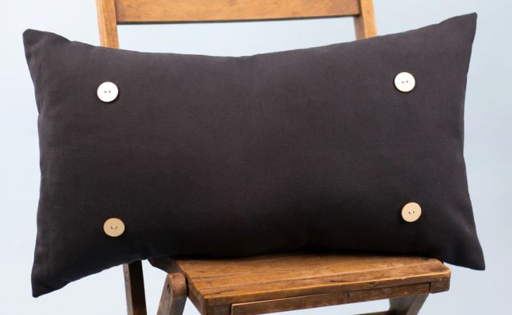 BLACK CANVAS LUCKYBIRD BUTTON PILLOW