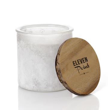White Compass Candle in River Rock Glass